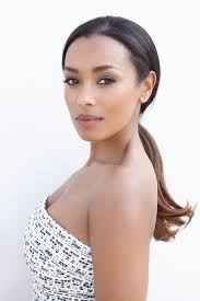 How tall is Melanie Liburd?